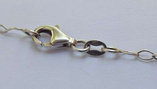 WOW !! AN EYE CATCHING SOLID STERLING SILVER CHARM BRACELET WITH ALLOT OF HEART !! I MEAN HEARTS !!