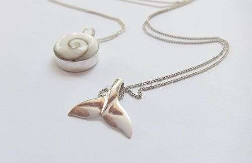 GENUINE SHELL & A WHALE TAIL !! TWO STERLING SILVER NECKLACES AND TWO STERLING SILVER PENDANTS !!
