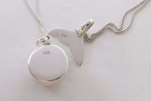 GENUINE SHELL & A WHALE TAIL !! TWO STERLING SILVER NECKLACES AND TWO STERLING SILVER PENDANTS !!