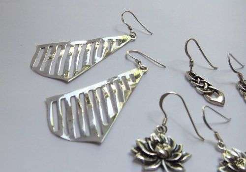 TRIPLE DEAL !! THREE STYLISH PAIRS OF SOLID STERLING SILVER EARRINGS !! BID FOR THE LOT !! SWEET !!