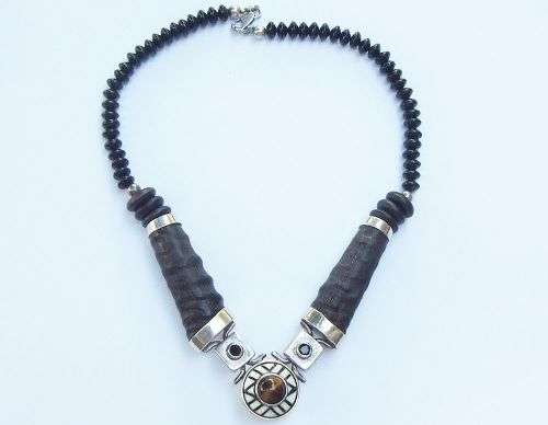 A ONE OF A KIND BUCK HORN , BONE , TIGERS EYE , BLACK STONE AND STERLING SILVER NECKLACE !!