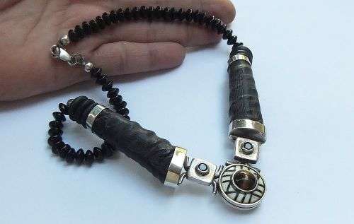 A ONE OF A KIND BUCK HORN , BONE , TIGERS EYE , BLACK STONE AND STERLING SILVER NECKLACE !!