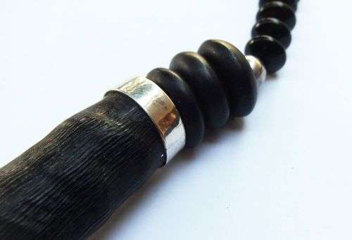 A ONE OF A KIND BUCK HORN , BONE , TIGERS EYE , BLACK STONE AND STERLING SILVER NECKLACE !!