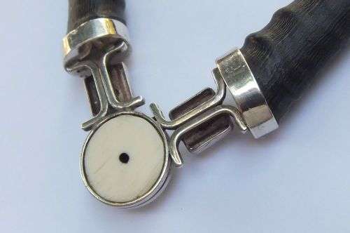 A ONE OF A KIND BUCK HORN , BONE , TIGERS EYE , BLACK STONE AND STERLING SILVER NECKLACE !!