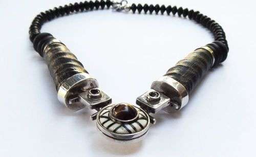 A ONE OF A KIND BUCK HORN , BONE , TIGERS EYE , BLACK STONE AND STERLING SILVER NECKLACE !!