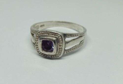 KYK !! A LOVELY SOLID STERLING SILVER RING SET WITH A SINGLE FACETED PURPLE STONE !! FULLY TESTED !!