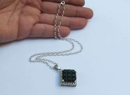 A GORGEOUS STERLING SILVER PENDANT WITH A BIG FACETED GREEN STONE PLUS A STERLING SILVER NECKLACE !!