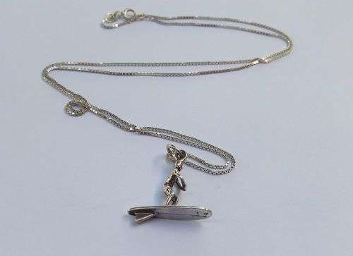 A UNIQUE OLD SOLID STERLING SILVER SURFER PENDANT WITH A STERLING SILVER NECKLACE !! SWEET DEAL !!