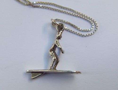 A UNIQUE OLD SOLID STERLING SILVER SURFER PENDANT WITH A STERLING SILVER NECKLACE !! SWEET DEAL !!