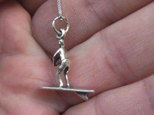 A UNIQUE OLD SOLID STERLING SILVER SURFER PENDANT WITH A STERLING SILVER NECKLACE !! SWEET DEAL !!