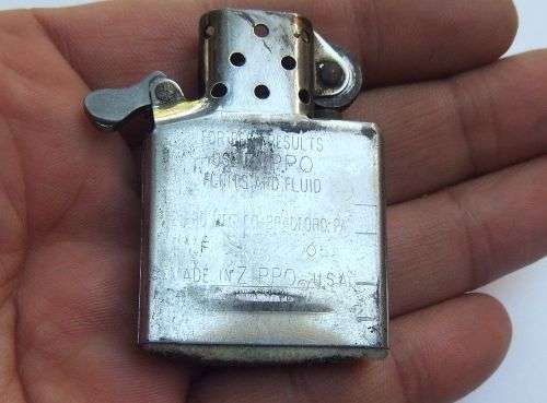 AN ORIGINAL ` GUN METAL ` ZIPPO !! SPARKING AND WORKING !! FREE COMBINING !! JUST ADD FUEL !!