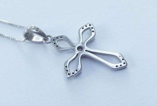 A DAINTY STERLING SILVER NECKLACE AND STERLING SILVER CROSS SET WITH FACETED STONES !!FREE COMBINING