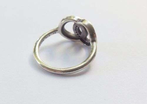 AWESOME FIND !! A SOLID STERLING SILVER DESIGNER RING BY PANDORA IN EXCELLENT CONDITION !! VALUE !!
