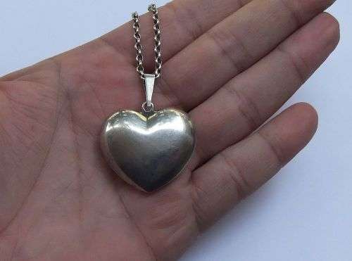 A BIG FAT STERLING SILVER HEART PENDANT WITH A STERLING SILVER NECKLACE !! GREAT DEAL !!
