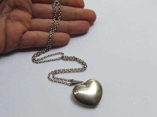 A BIG FAT STERLING SILVER HEART PENDANT WITH A STERLING SILVER NECKLACE !! GREAT DEAL !!