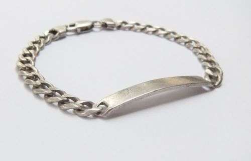 LAST OF THE HEAVIES !! A STRONG EXTRA SOLID STERLING SILVER IDENTITY BRACELET !! BID TO WIN !!