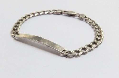 LAST OF THE HEAVIES !! A STRONG EXTRA SOLID STERLING SILVER IDENTITY BRACELET !! BID TO WIN !!