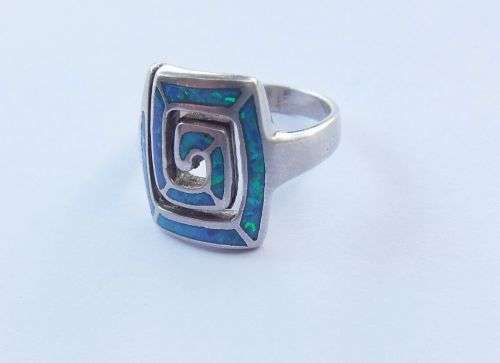 WOW !! AN EYE CATCHING SOLID STERLING SILVER AND FIRE OPAL RING IN EXCELLENT CONDITION !! GREAT FIND