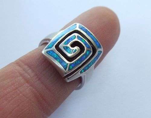 WOW !! AN EYE CATCHING SOLID STERLING SILVER AND FIRE OPAL RING IN EXCELLENT CONDITION !! GREAT FIND