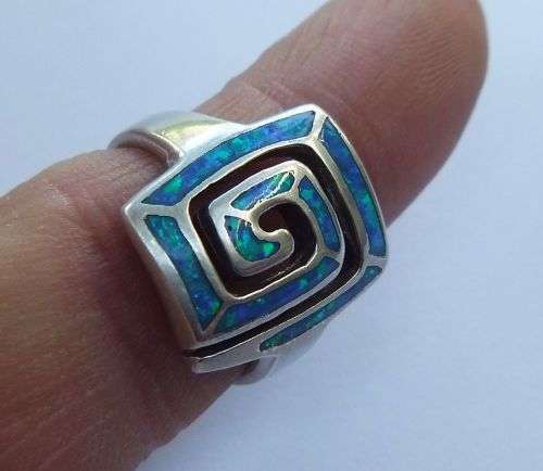 WOW !! AN EYE CATCHING SOLID STERLING SILVER AND FIRE OPAL RING IN EXCELLENT CONDITION !! GREAT FIND