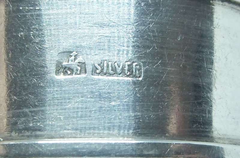 AN OLD SOLID STERLING SILVER NAPKIN RING BY DURBAN SILVERSMITH NORMAN WATSON - DICK KING STAMP