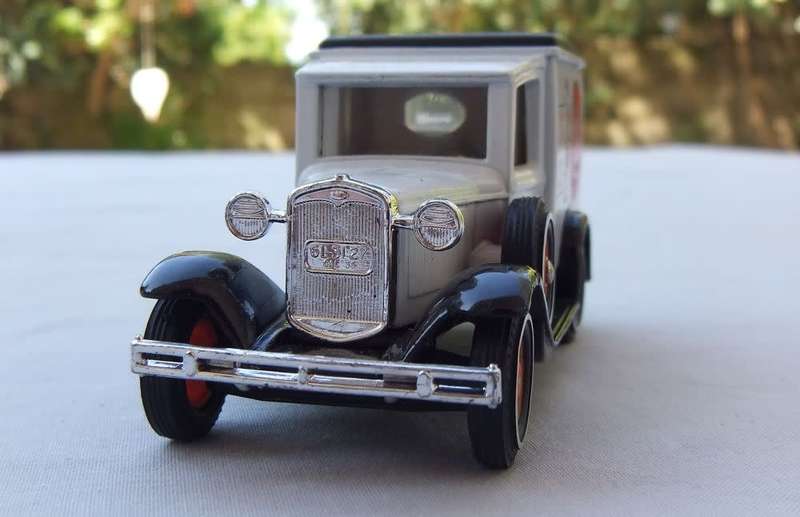 A VINTAGE DIE CAST METAL MODEL OF THE 1930 MODEL `A` FORD VAN BY MATCHBOX MODELS OF YESTERYEAR