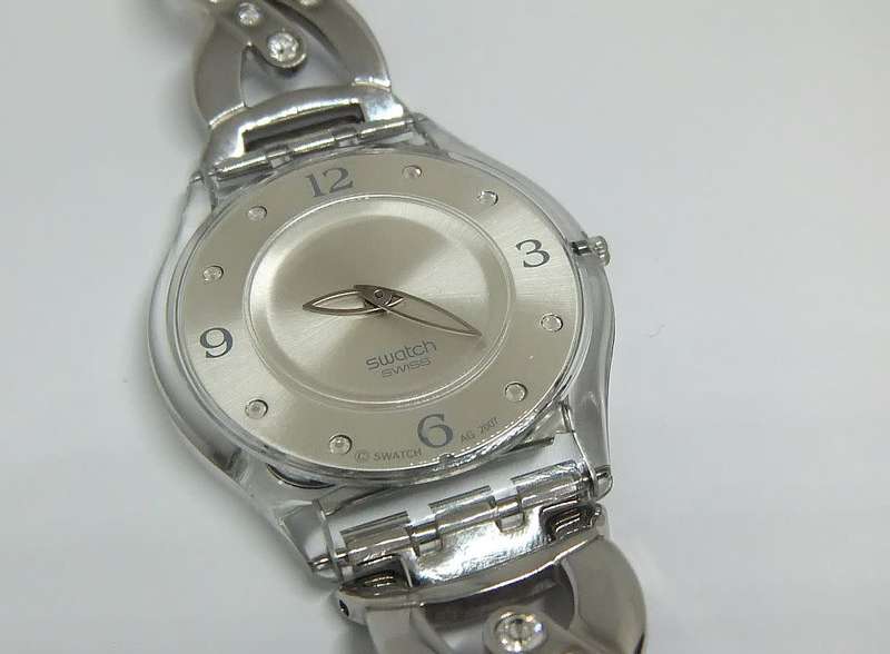 A CLASSY GENUINE SWISS SWATCH WATCH IN EXCELLENT CONDITION WITH A BRAND NEW BATTERY !! 100% AWESOME