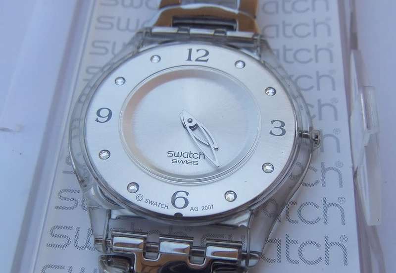 A CLASSY GENUINE SWISS SWATCH WATCH IN EXCELLENT CONDITION WITH A BRAND NEW BATTERY !! 100% AWESOME