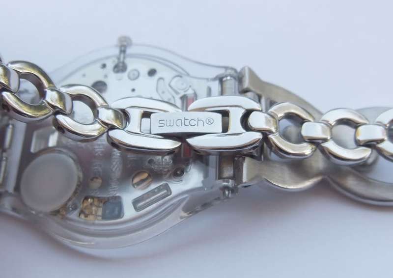 A CLASSY GENUINE SWISS SWATCH WATCH IN EXCELLENT CONDITION WITH A BRAND NEW BATTERY !! 100% AWESOME