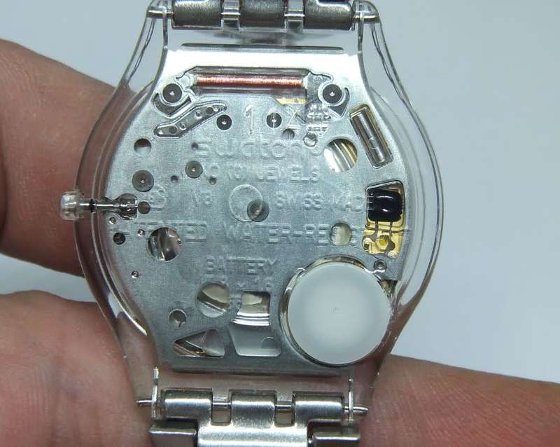 A CLASSY GENUINE SWISS SWATCH WATCH IN EXCELLENT CONDITION WITH A BRAND NEW BATTERY !! 100% AWESOME