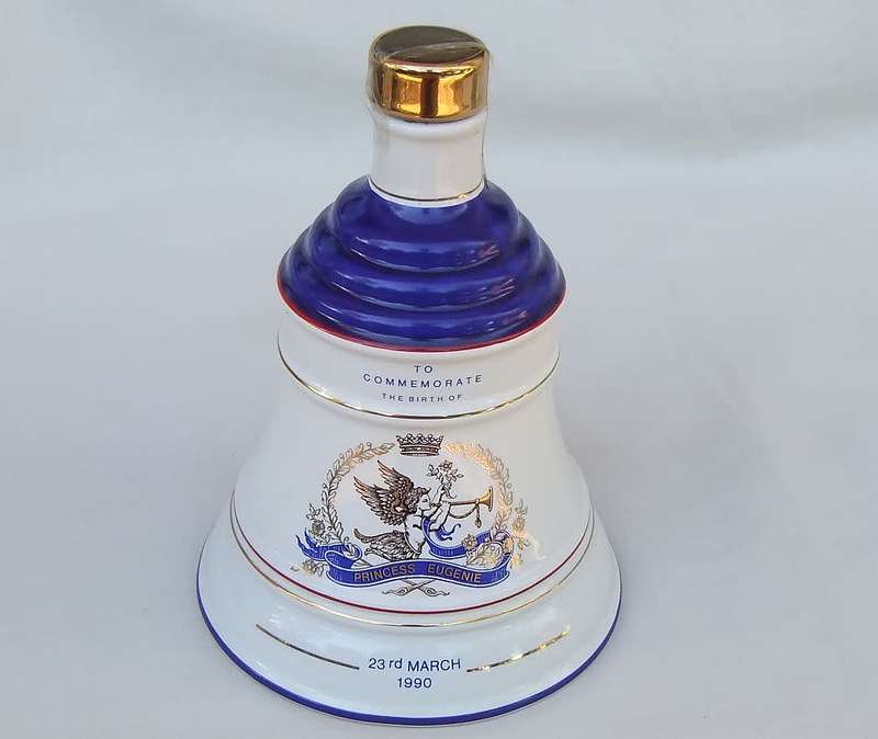 A vintage Bells whisky decanter commemorating the birth of Princess Eugenie 23 March 1990 by Wade