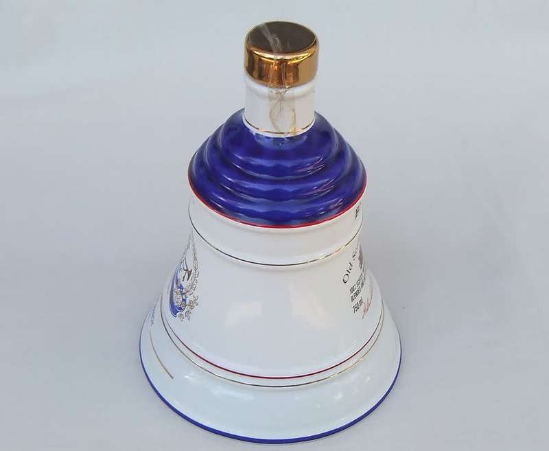 A vintage Bells whisky decanter commemorating the birth of Princess Eugenie 23 March 1990 by Wade
