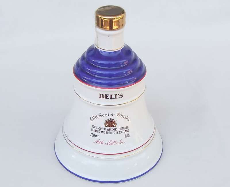 A vintage Bells whisky decanter commemorating the birth of Princess Eugenie 23 March 1990 by Wade