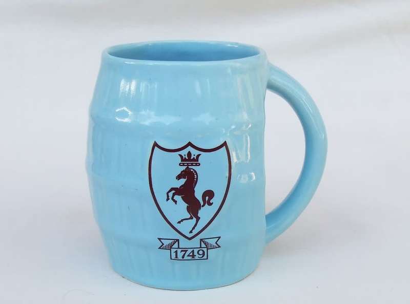 A vintage RSA made barrel shaped jug by Flora Ann pottery Johannesburg