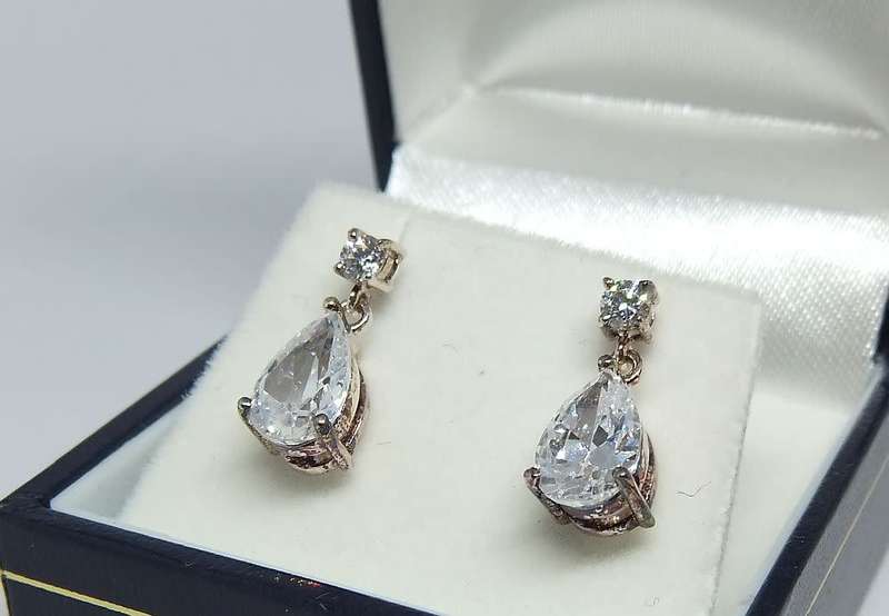 A pair of sterling silver teardrop earrings with clear insets - Never worn - With box