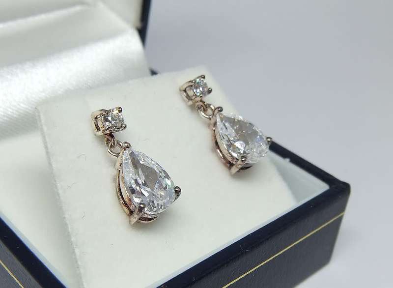A pair of sterling silver teardrop earrings with clear insets - Never worn - With box