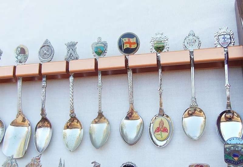 A vintage metal spoon rack with 36 souvenir spoons in great condition # 2
