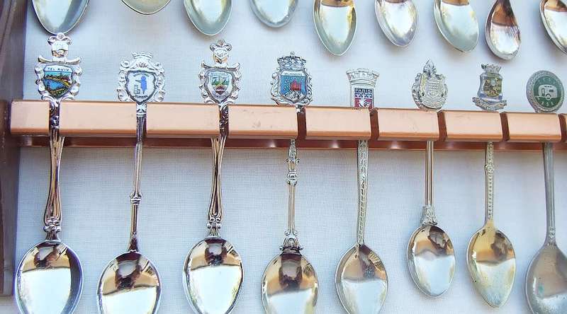 A vintage metal spoon rack with 36 souvenir spoons in great condition # 2