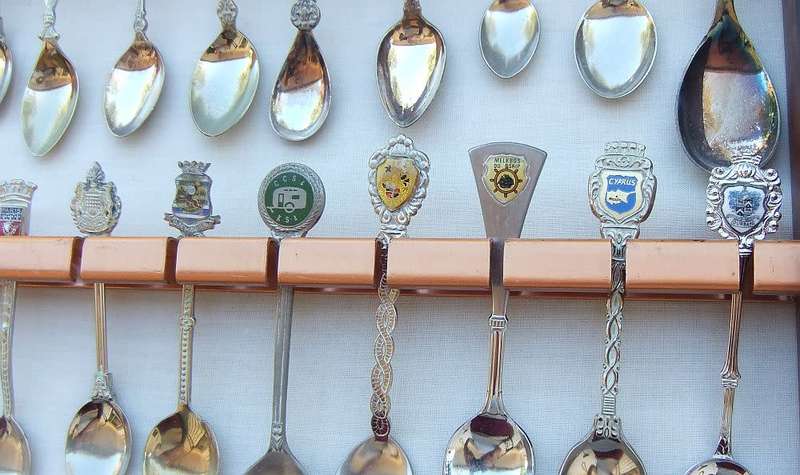 A vintage metal spoon rack with 36 souvenir spoons in great condition # 2