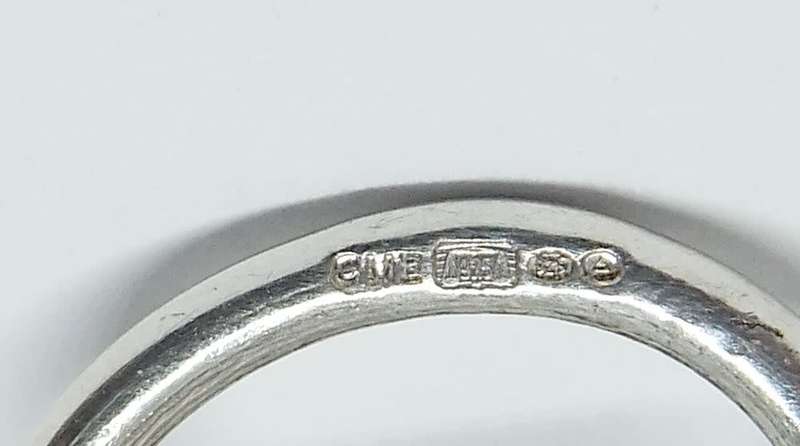 A vintage Birmingham hallmarked  sterling silver pill holder fob with spring action clip