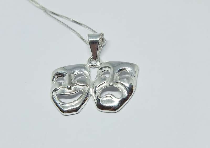 A genuine sterling silver necklace with sterling silver double mask pendant - Brand new