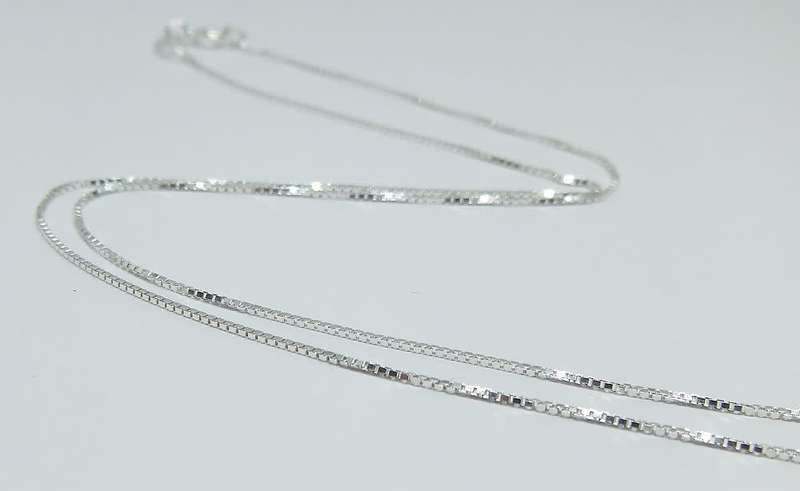A genuine sterling silver necklace with sterling silver double mask pendant - Brand new