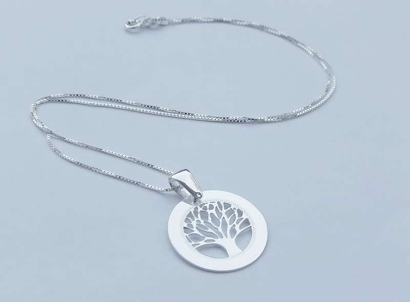 A genuine sterling silver necklace and pendant with tree of life motif - Brand new - Boxed