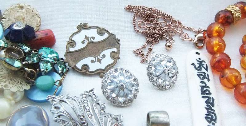 A joblot of vintage jewelry items , accessories and spare parts