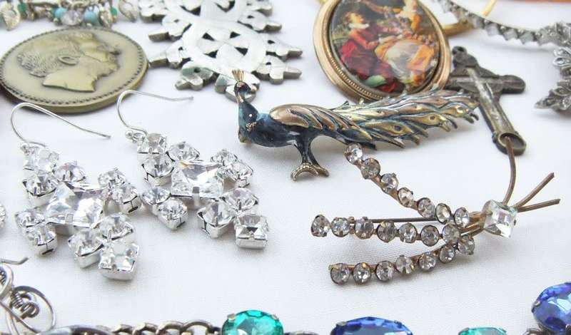 A joblot of vintage jewelry items , accessories and spare parts