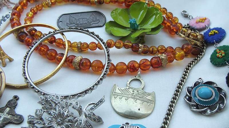 A joblot of vintage jewelry items , accessories and spare parts