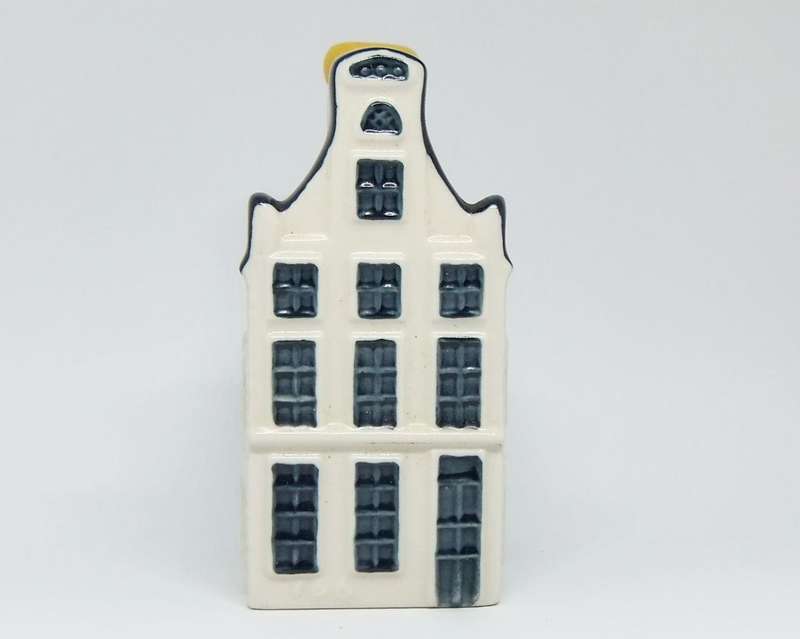 A vintage number 19 Dutch house form decanter by Delfts made for KLM with original contents - sealed