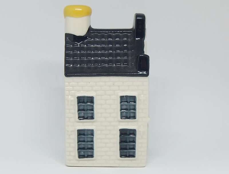 A vintage number 19 Dutch house form decanter by Delfts made for KLM with original contents - sealed