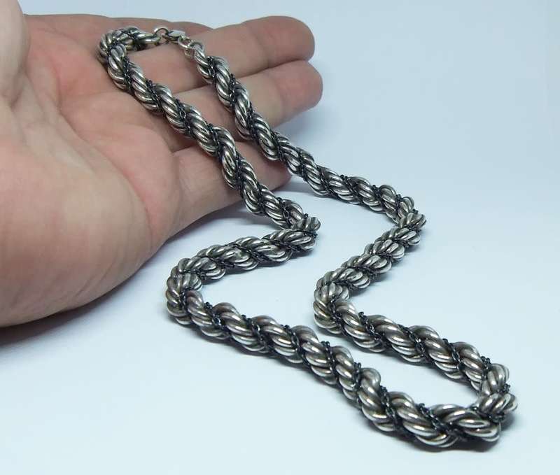 A unique heavy vintage hallmarked silver twist style necklace with a sterling silver clasp