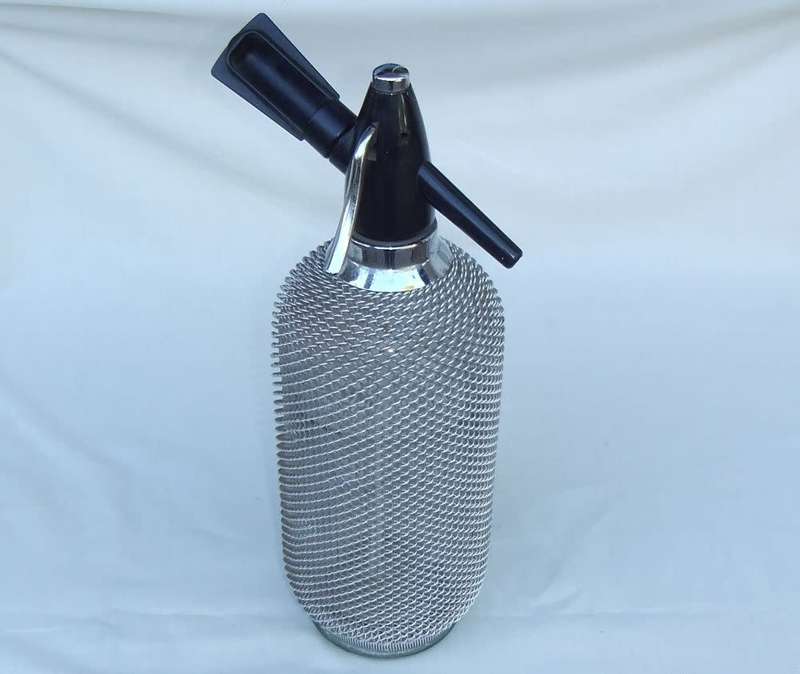 A tall and heavy vintage look soda syphon